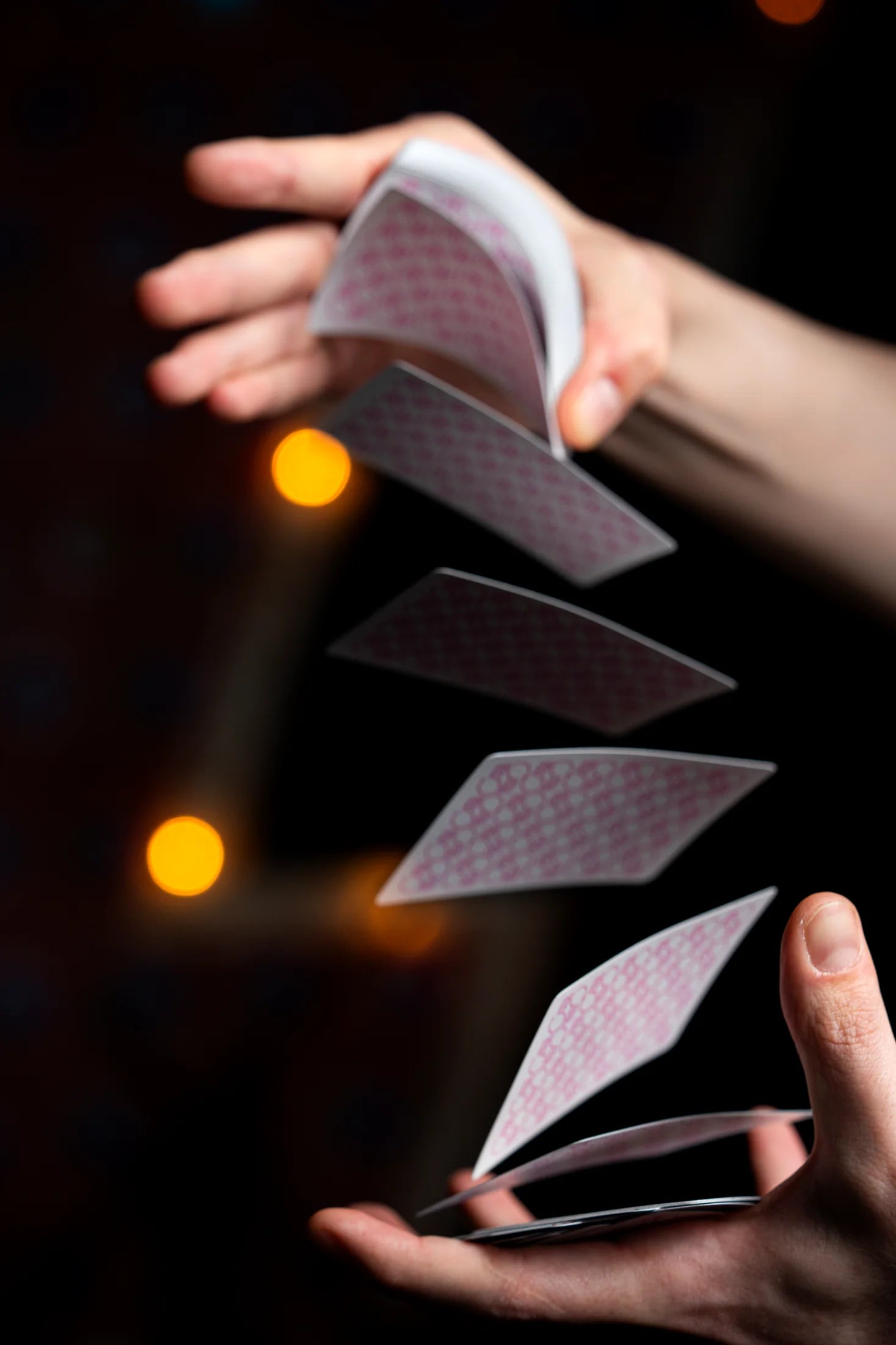 Players cards suspended during a cardistry flourish