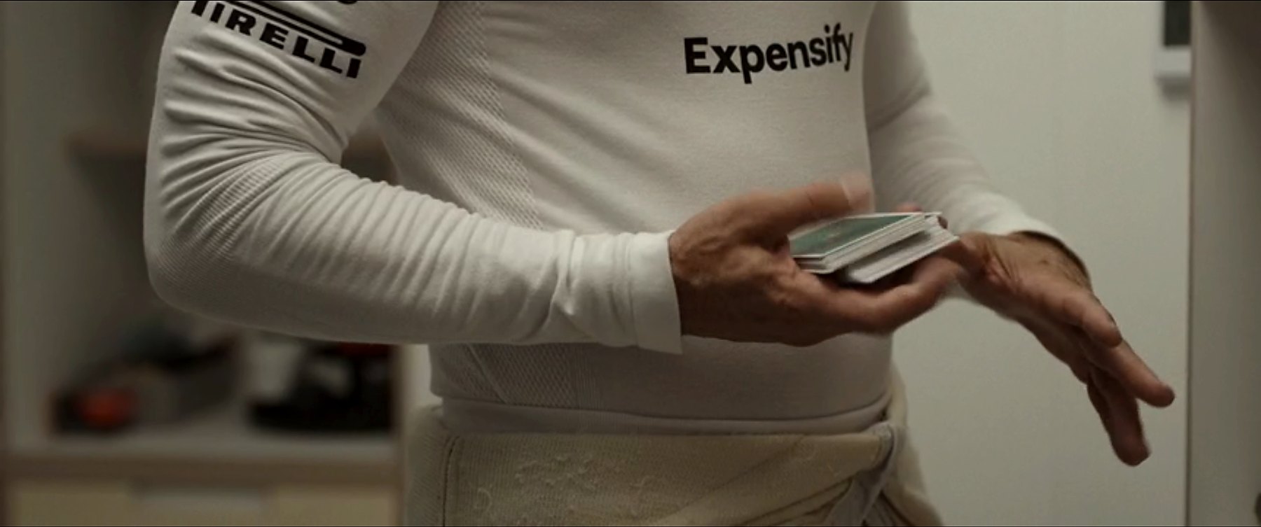 Cards handled in a racing suit