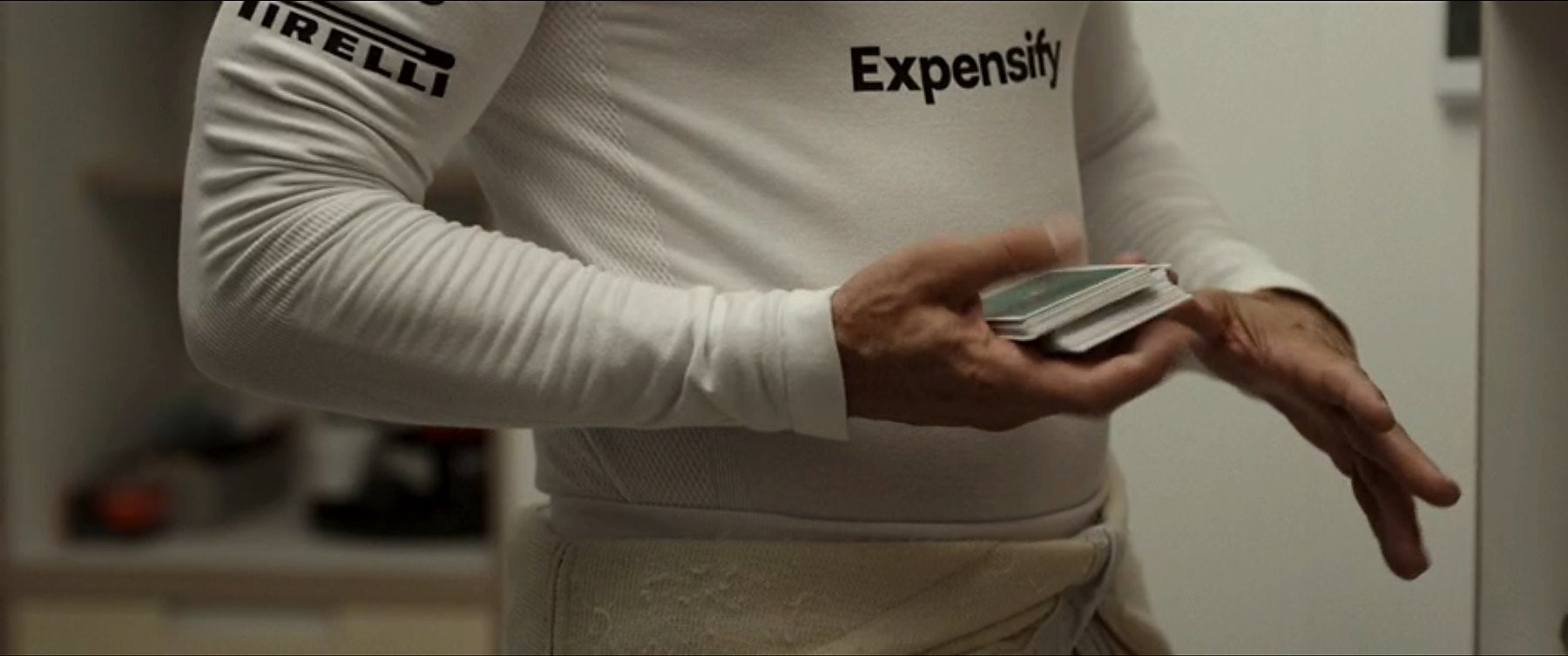Cards handled in a racing suit