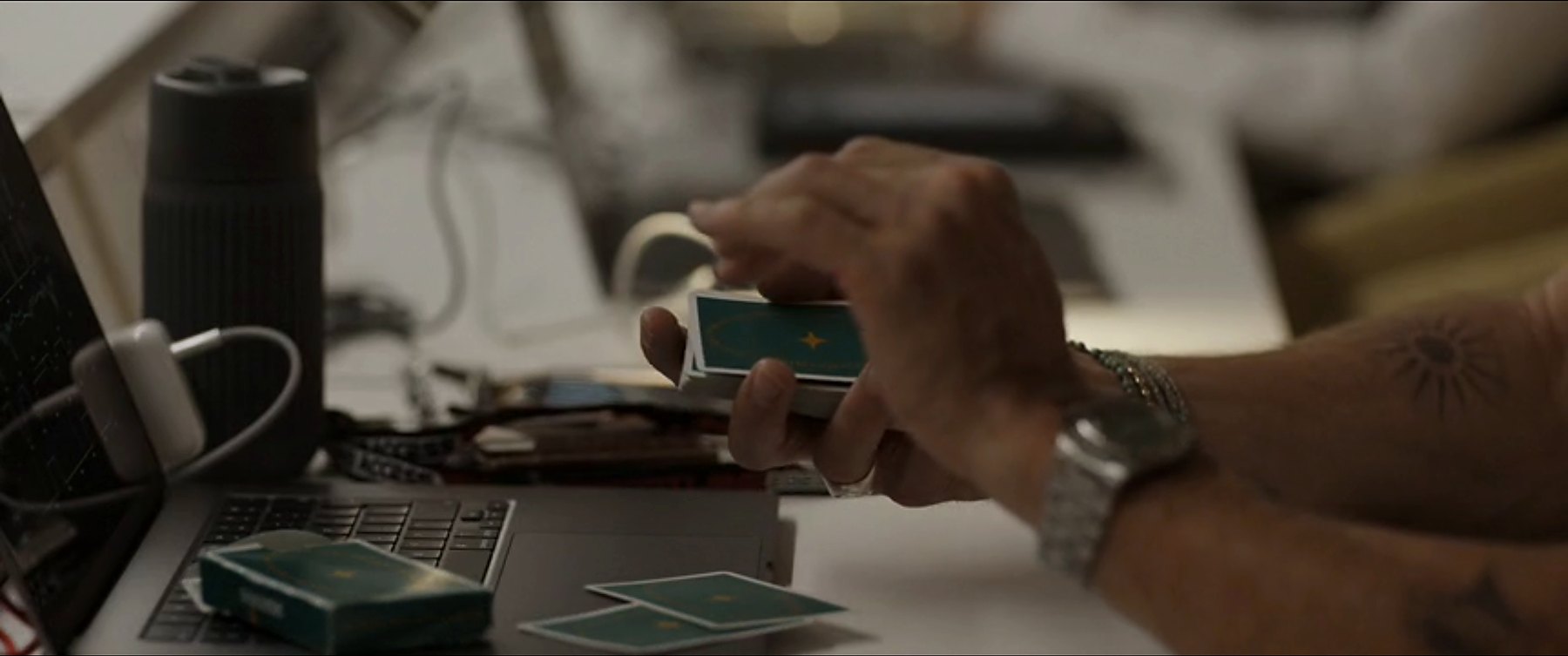 Cartelago cards handled at a workbench