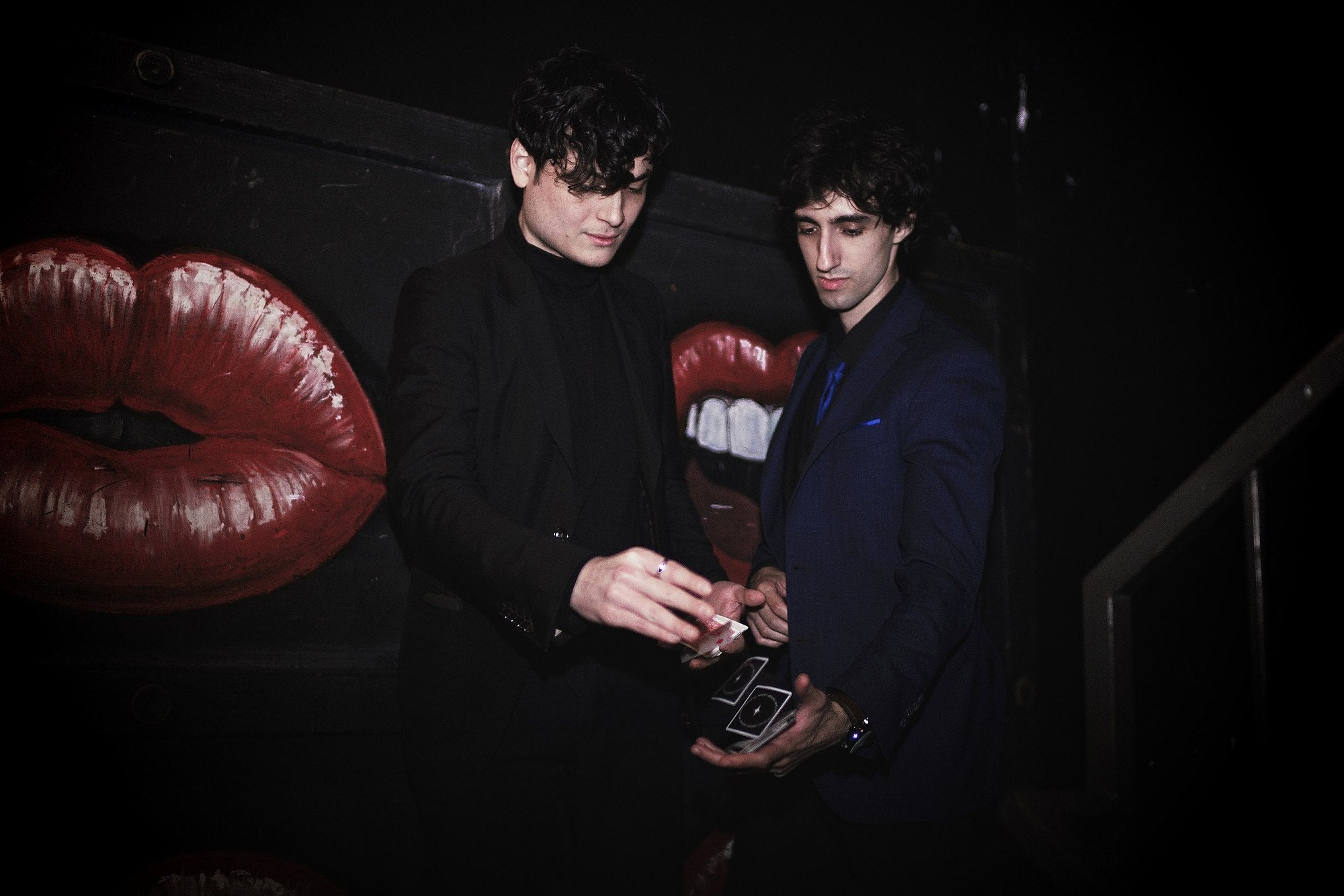Franco Pascali performing with playing cards