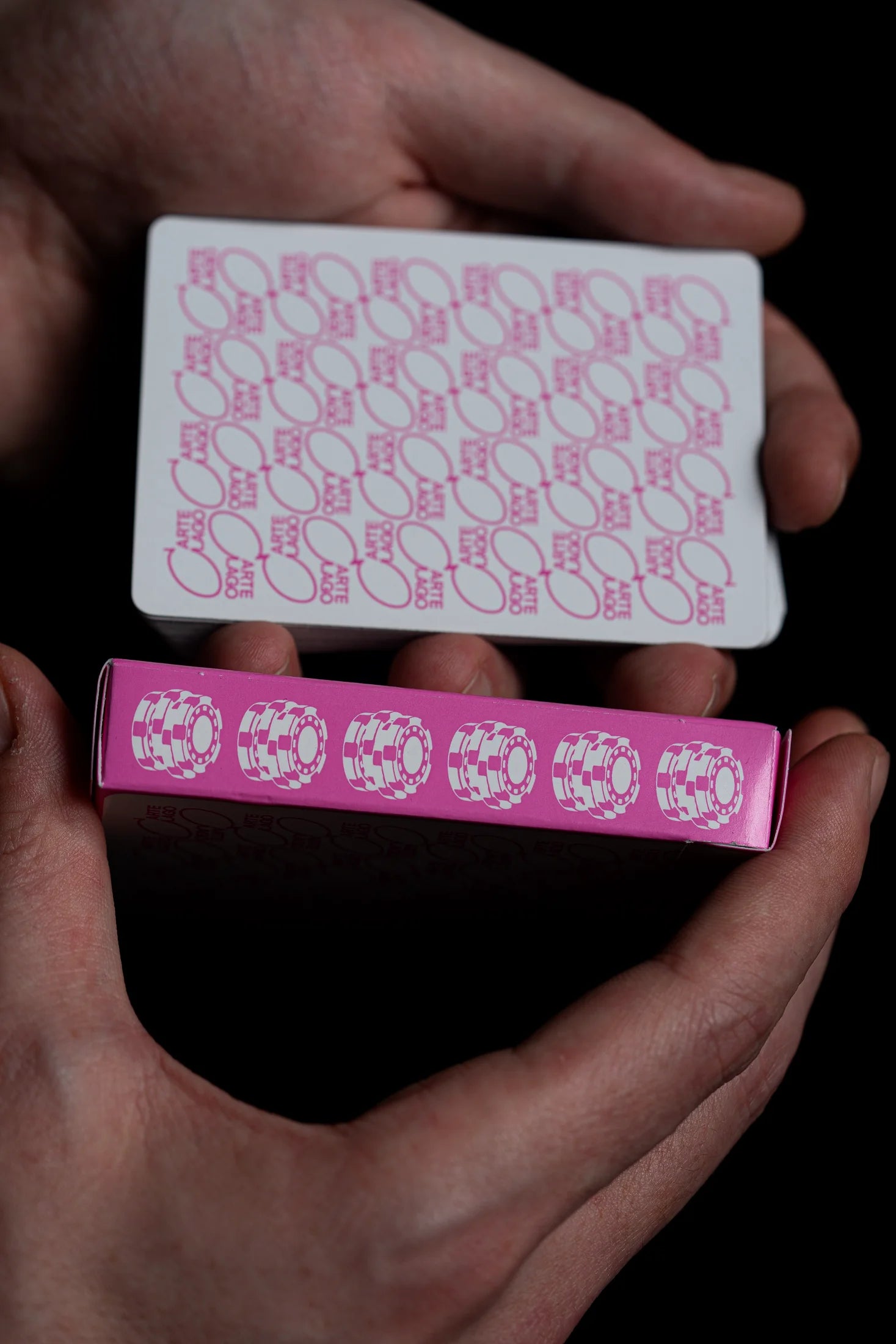 Players card back beside the pink tuck box