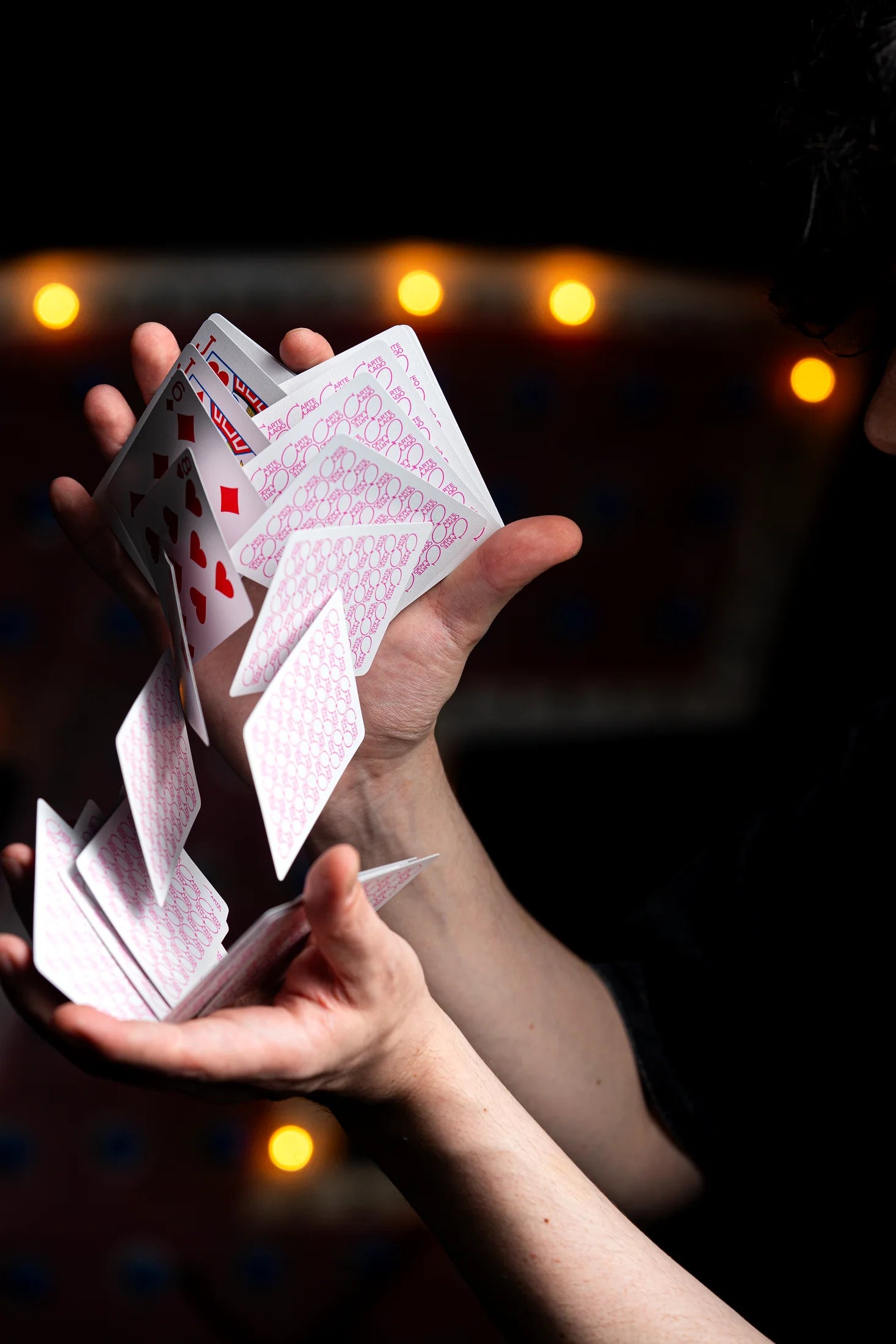 Players cards falling through a dramatic cascade